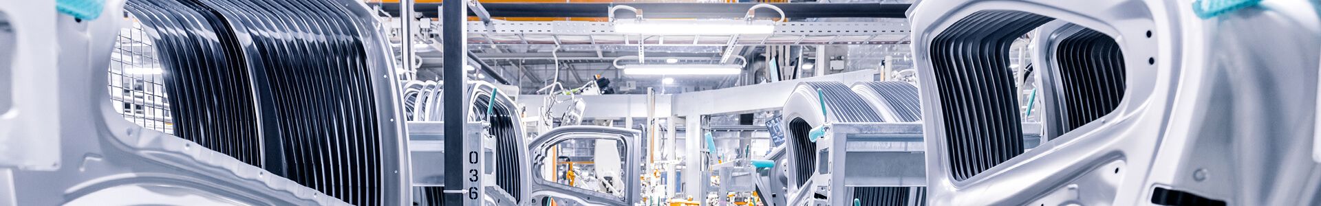 A view of the production hall with well-designed lighting, which is crucial for efficiency in the automotive industry